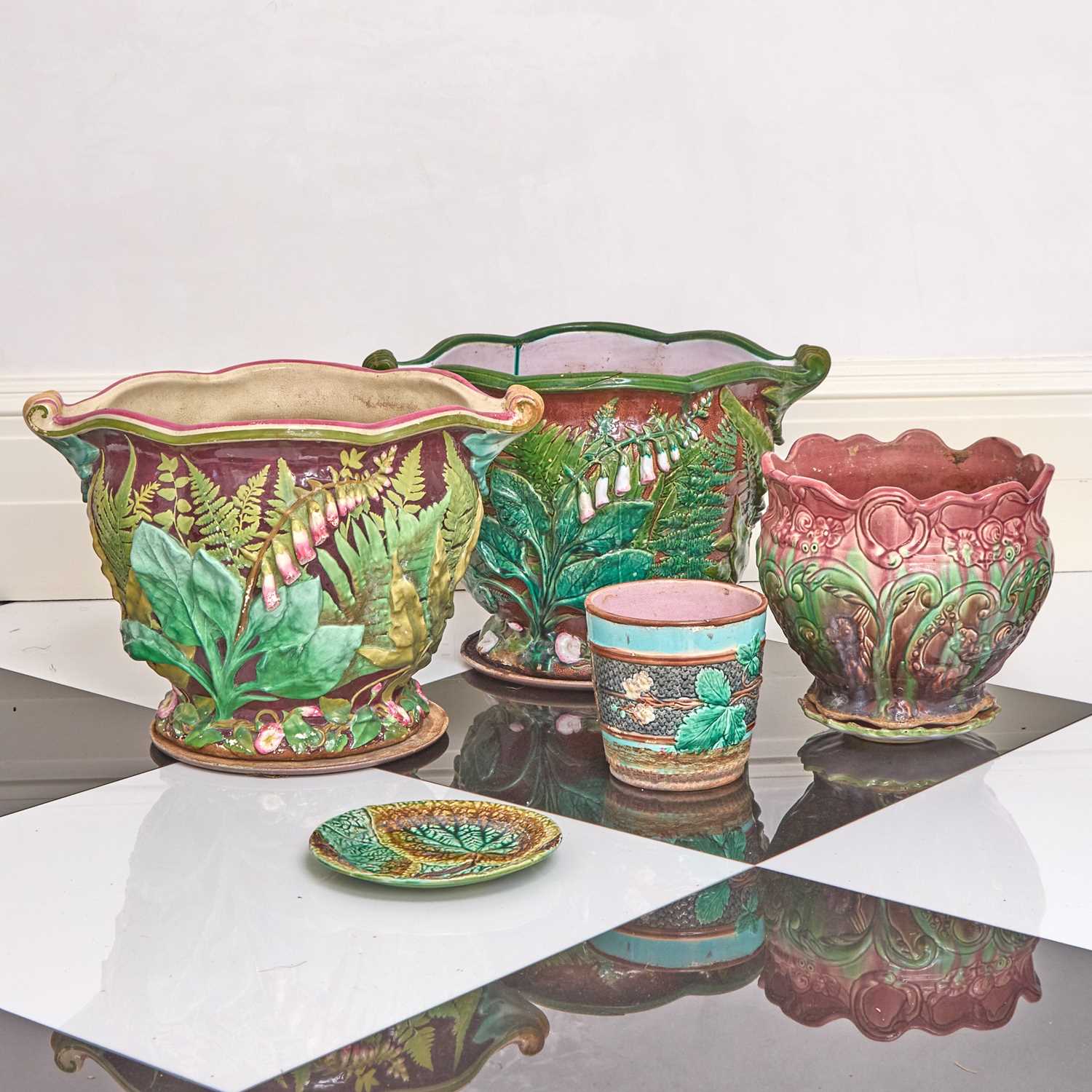 Lot 264 - Two Minton Majolica Foxglove and Fern Planters with Underplates