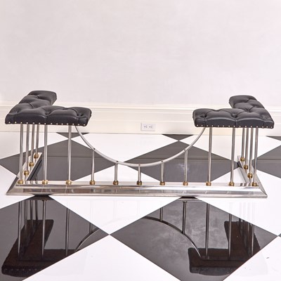 Lot 263 - Large Polished Steel and Brass Upholstered Club Fireplace Fender