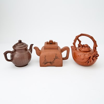 Lot 483 - Three Chinese Yixing Pottery Teapots