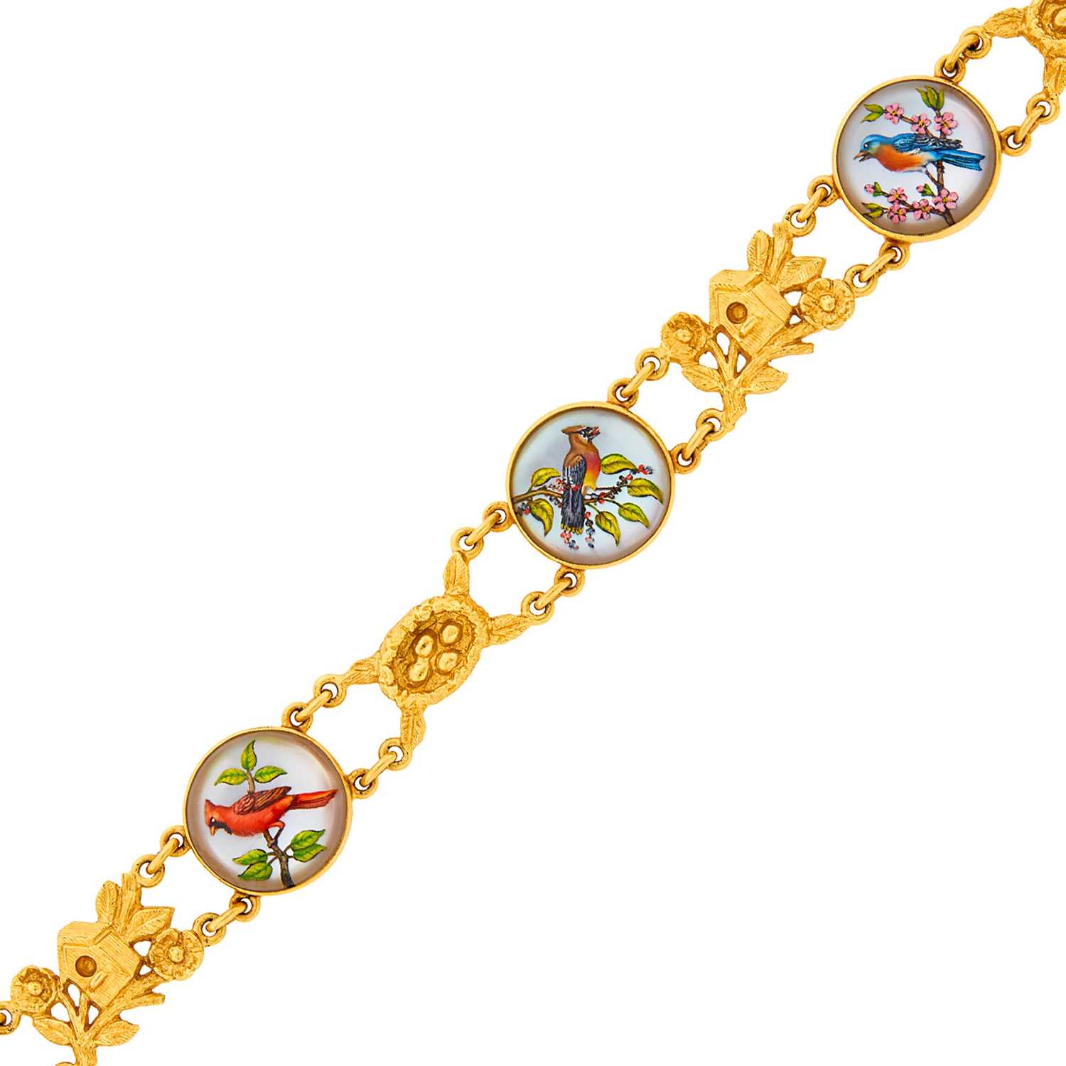 Lot 1071 - Gold and Rock Crystal Intaglio Bird Bracelet