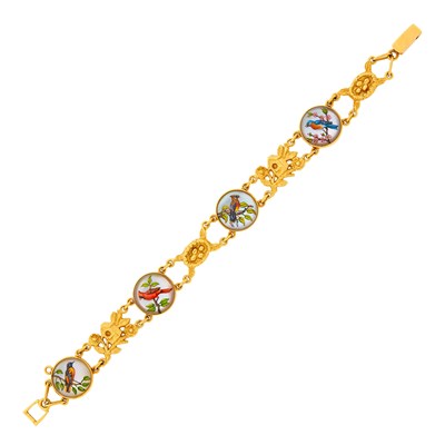 Lot 1071 - Gold and Rock Crystal Intaglio Bird Bracelet