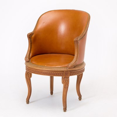 Lot 229 - Louis XV/XVI Transitional Style Carved Walnut Leather Upholstered Barrel Back Bergère