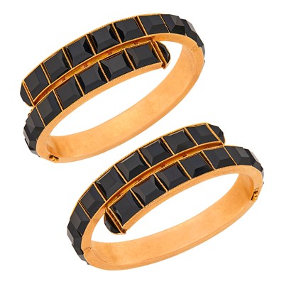 Lot 67 - Pair of Antique Rose Gold and Black Onyx Crossover Bangle Bracelets