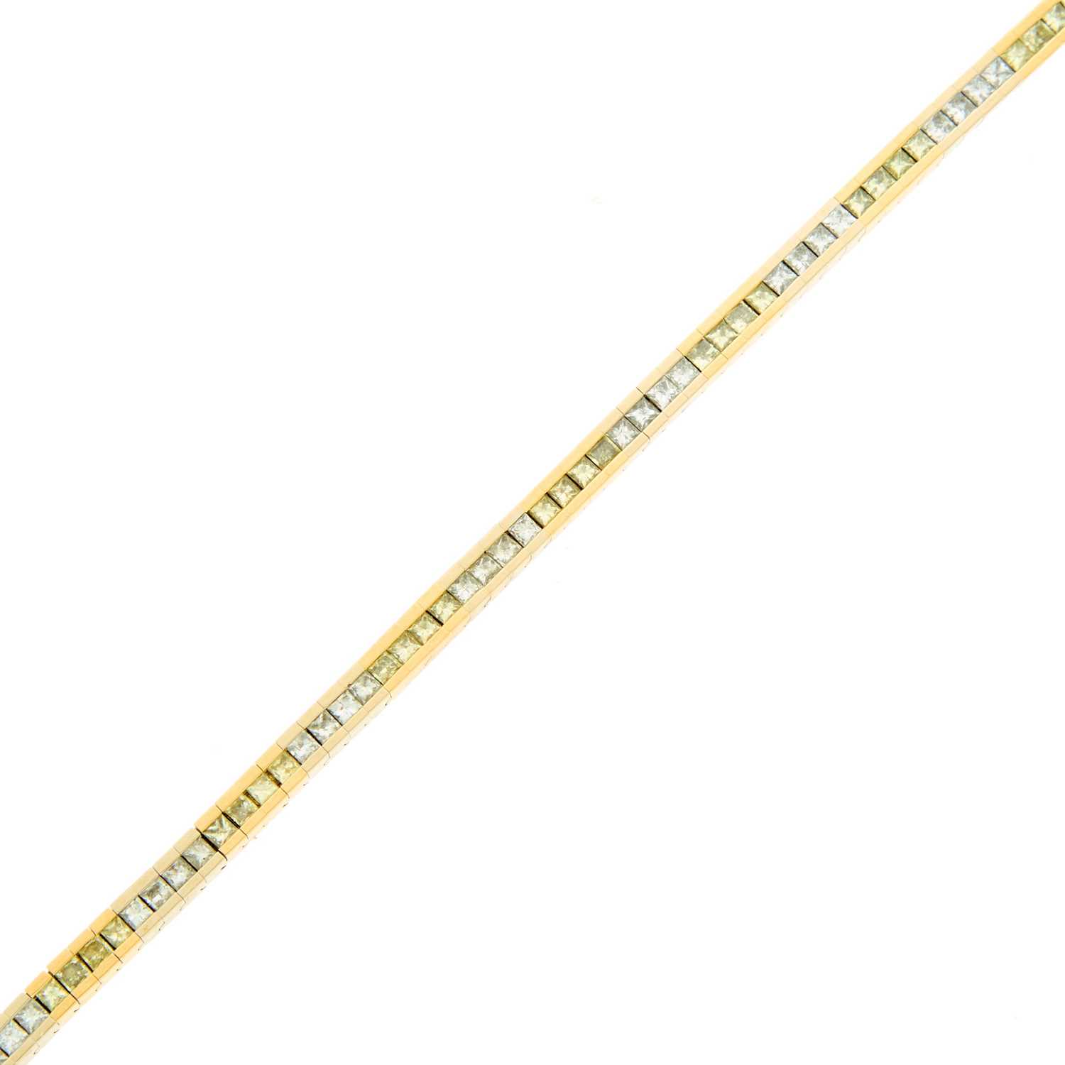 Lot 2193 - Two-Color Gold, Diamond and Colored Diamond Bracelet