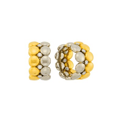 Lot 7 - Cartier Pair of Two-Color Gold and Diamond 'Honeymoon' Hoop Earclips, France
