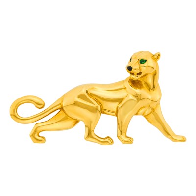 Lot 24 - Cartier Gold, Emerald and Black Onyx Panther Clip-Brooch, France