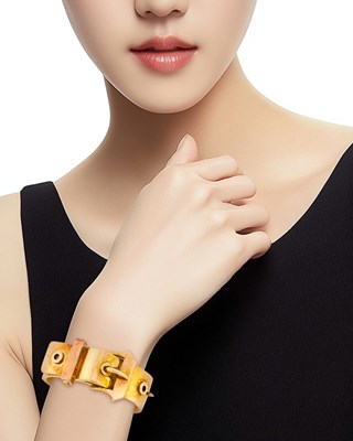 Lot 1069 - Antique Two-Color Gold Buckle Bangle Bracelet