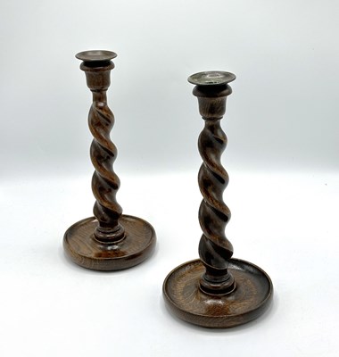 Lot 1187 - Pair of English Oak Barley Twist Candlesticks