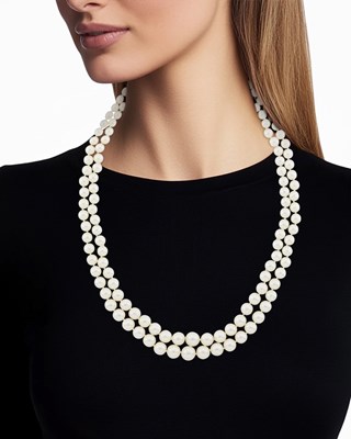 Lot 1035 - Double Strand Cultured Pearl Necklace with White Gold and Diamond Clasp