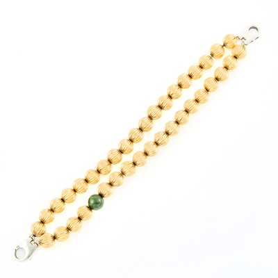 Lot 2206 - Double Strand Two-Color Gold and Nephrite Bead Bracelet