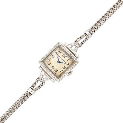 Lot 1057 - C. H. Meylan Platinum and Diamond Wristwatch, Retailed by Tiffany & Co.