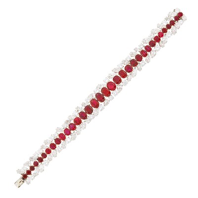 Lot 247 - Boucheron Paris Platinum, Gold, Ruby and Diamond Bracelet