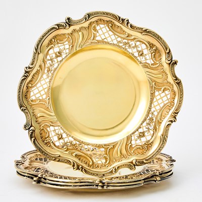 Lot 225 - Four French Louis XV Style Sterling Silver Gilt Dessert Plates