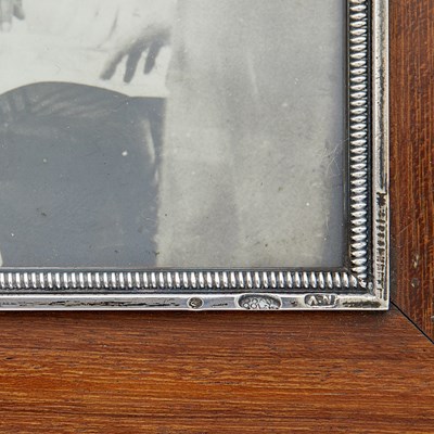 Lot 186 - Fabergé Silver and Enamel Mounted Wood Photograph Frame