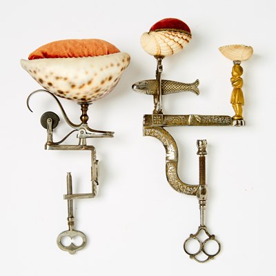 Lot 1247 - Two Steel Sewing Clamps Incorporating Seashells