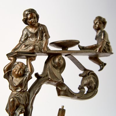 Lot 1252 - German Cast Iron Sewing Clamp Depicting Children on a Seesaw