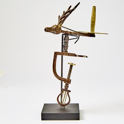 Lot 1244 - Cast Iron and Brass Reindeer / Stag Head Sewing Clamp
