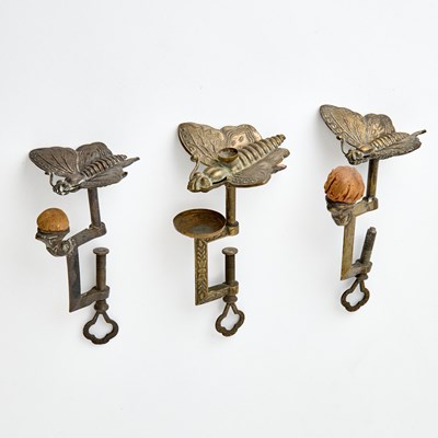 Lot 225 - Three Silvered Metal and Brass Butterfly Sewing Clamps with Pin Cushions