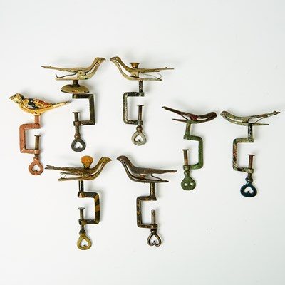 Lot 1243 - Seven Painted Bird Sewing Clamps