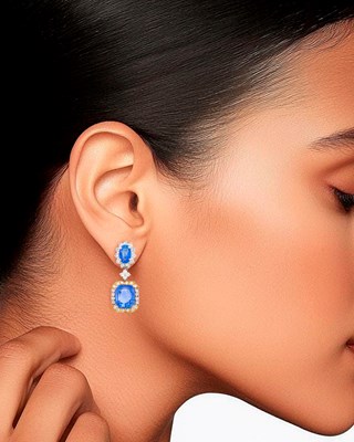 Lot 28 - Pair of Two-Color Gold, Sapphire and Diamond Pendant-Earclips