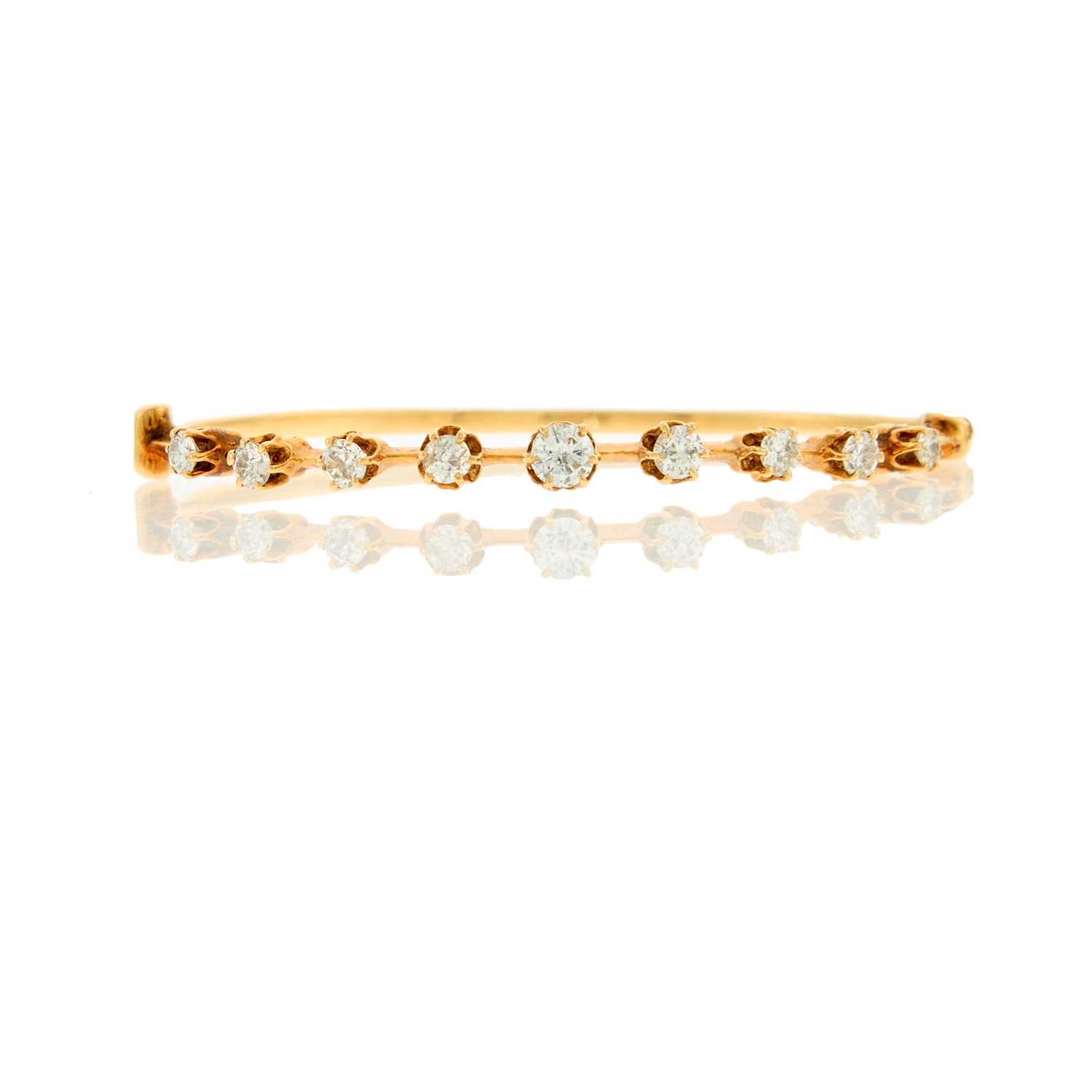 Lot 2144 - Gold and Diamond Bangle Bracelet