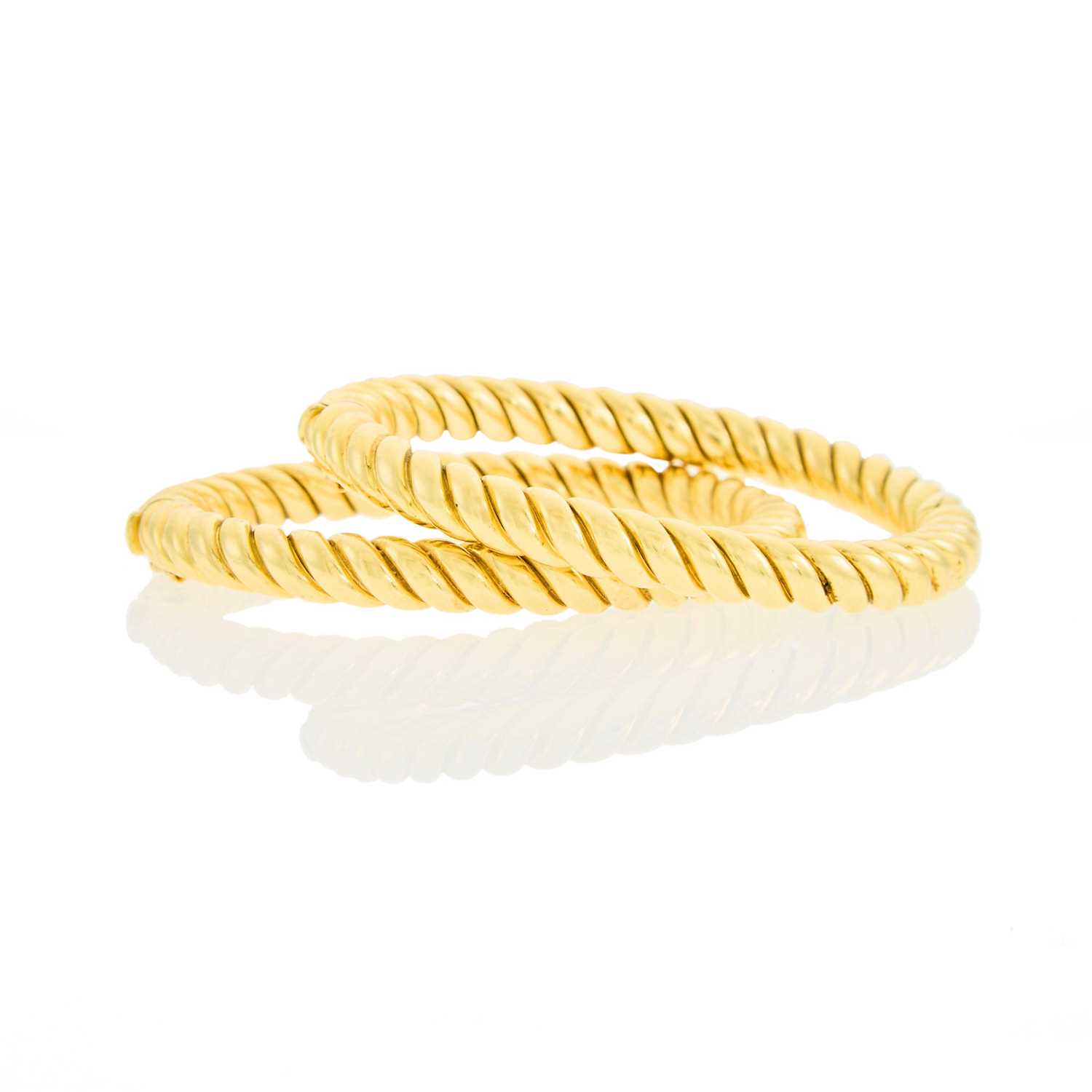Lot 135 - Van Cleef & Arpels Pair of Fluted Gold Bangle Bracelets
