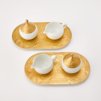 Lot 62 - Bjorn Wiinblad for Rosenthal Gilt Decorated Porcelain 'Magic Flute Gold' Pattern Dinner Service