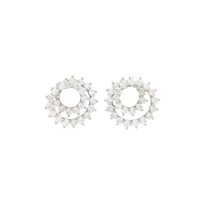 Lot 1138 - Tiffany & Co. Pair of Platinum and Diamond 'Swirl' Earclips