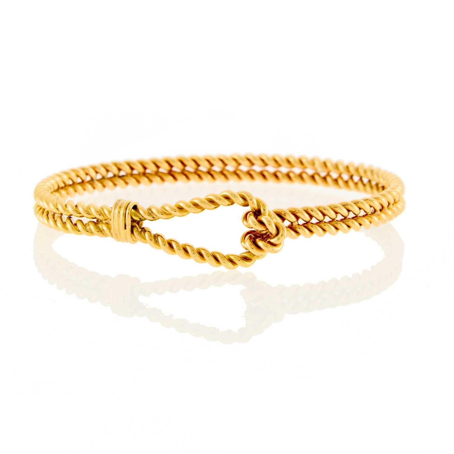 Lot 2018 - Gucci Gold Rope-Twist Bangle Bracelet