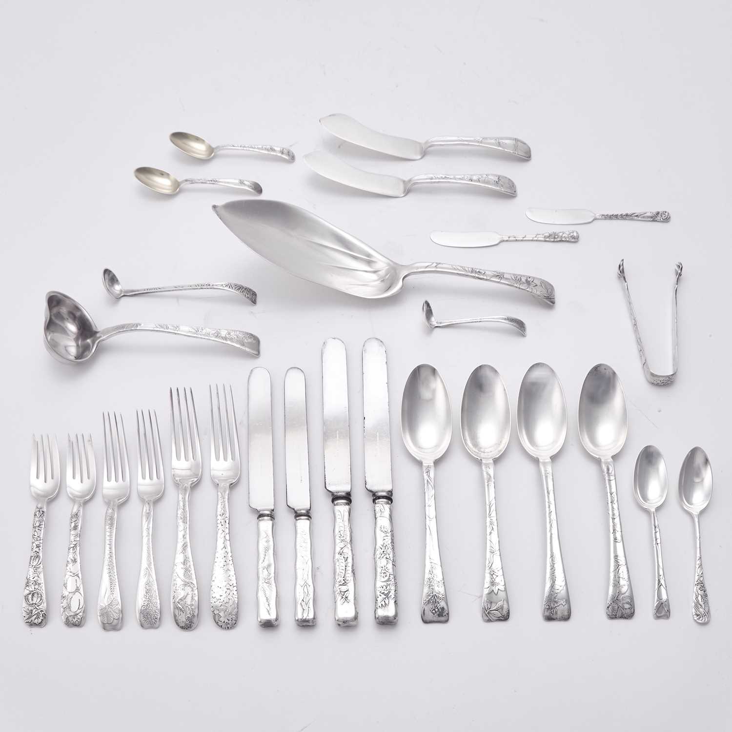 Lot 129 - Tiffany & Co. Sterling Silver "Lap Over Edge" Pattern Flatware Service