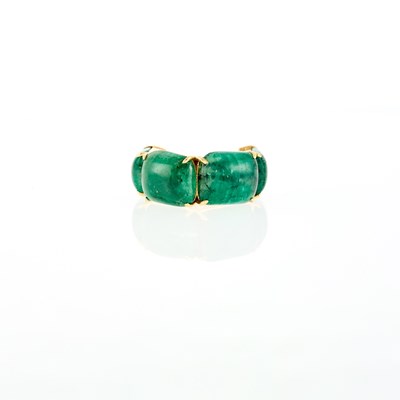 Lot 1164 - Gold and Cabochon Emerald Ring