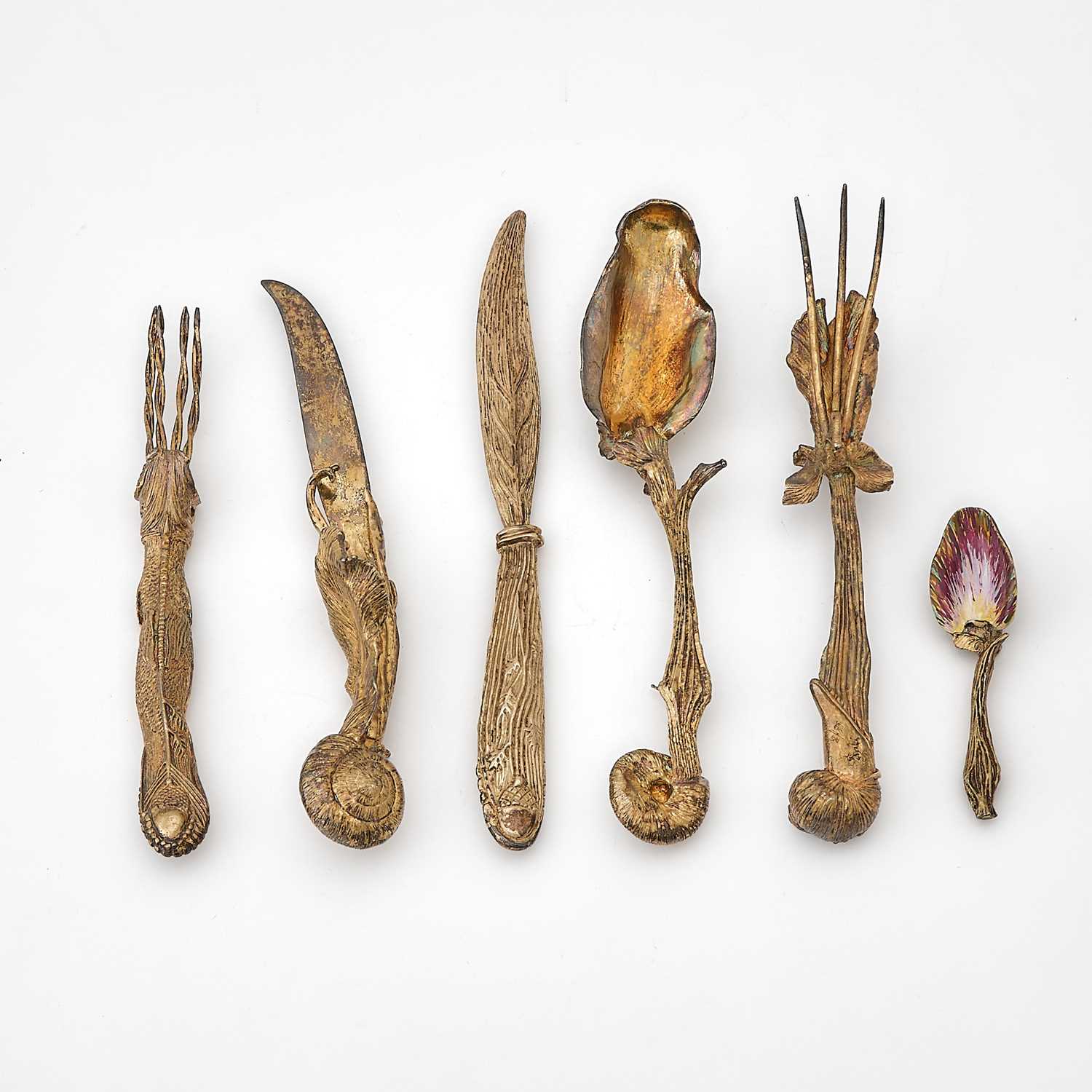 Lot 297 - After Salvador Dali Silver Gilt and Enamel "Ménagère Mollusc" Pattern Flatware Place Setting