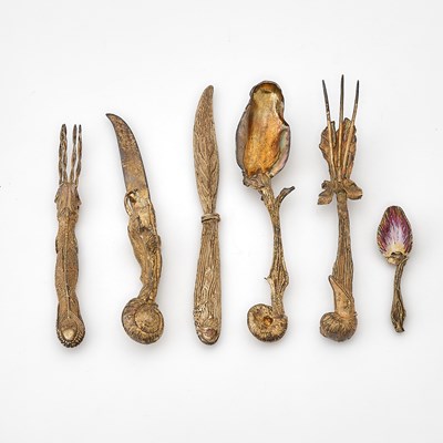 Lot 297 - After Salvador Dali Silver Gilt and Enamel "Ménagère Mollusc" Pattern Flatware Place Setting