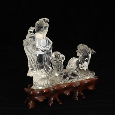 Lot 192 - A Chinese Rock Crystal Carving of a Guanyin and a Beast