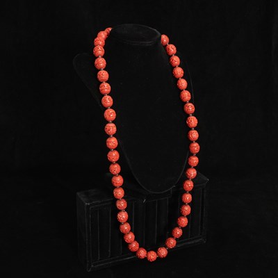 Lot 198 - Cinnabar Beaded Necklace