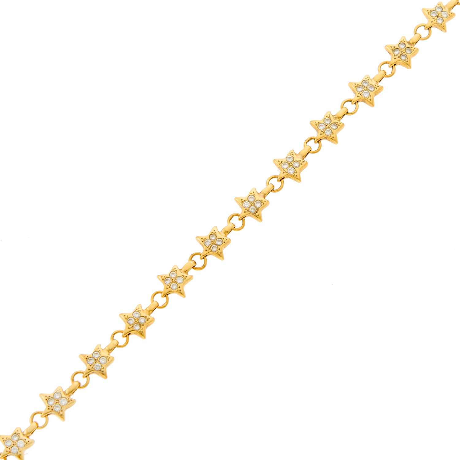 Lot 1016 - Tiffany & Co. Gold and Diamond Star Link Bracelet