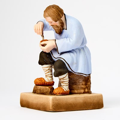 Lot 148 - Russian Porcelain Figure of a Bast Shoemaker