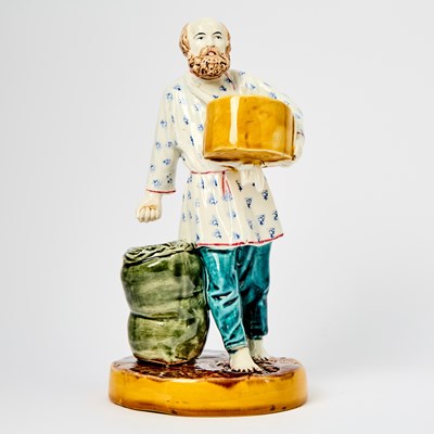 Lot 141 - Russian Glazed Pottery Figure of a Sower