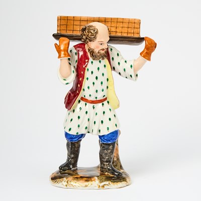 Lot 129 - Russian Porcelain Figure of Vendor Carrying a Tray