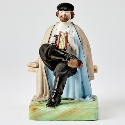 Lot 314 - Russian Porcelain Figure of an Accordion Player