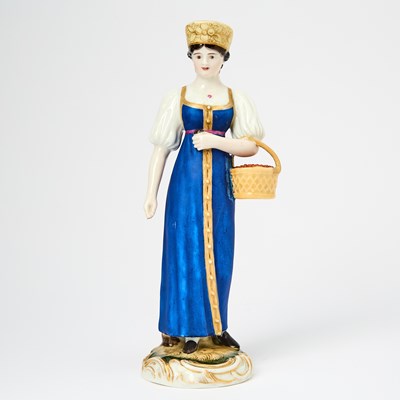 Lot 132 - Russian Porcelain Figure of a Woman with a Basket of Berries