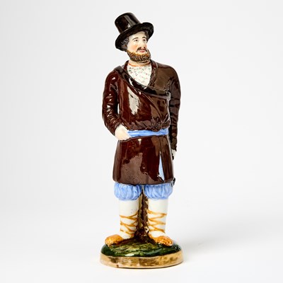 Lot 134 - Russian Porcelain Figure of a Peasant Man with Basket