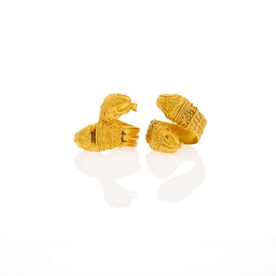 Lot 1044 - Pair of High Karat Gold Chimera Crossover Rings