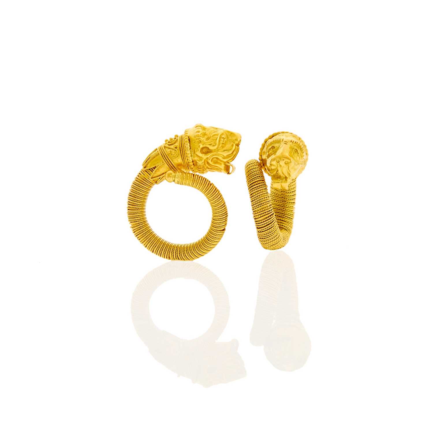 Lot 1031 - Pair of High Karat Gold Chimera Crossover Rings