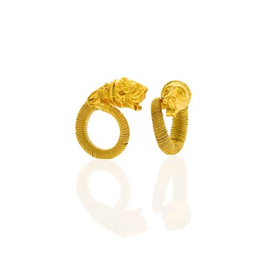 Lot 1031 - Pair of High Karat Gold Chimera Crossover Rings