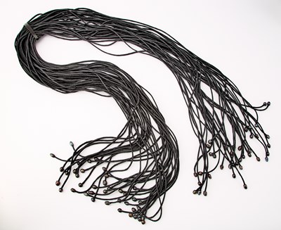 Lot 1018 - Group of Six Leather, Wood and Cloth Necklaces