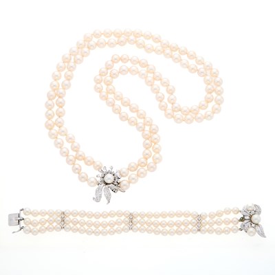 Lot 2078 - Double Strand Cultured Pearl Necklace with White Gold and Diamond Clasp and Triple Strand Bracelet