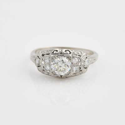 Lot 83 - Diamond Engagement Ring, 7 diamonds, center stone about 0.80 ct., 14K 1 dwt., stone damaged