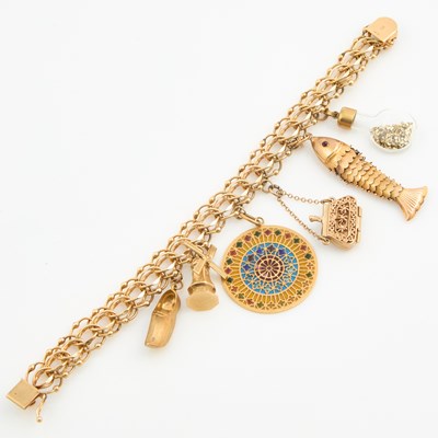 Lot 91 - Gold Charm Bracelet with 6 gold, stone, glass and enamel charms attached, 14K 29 dwt. all