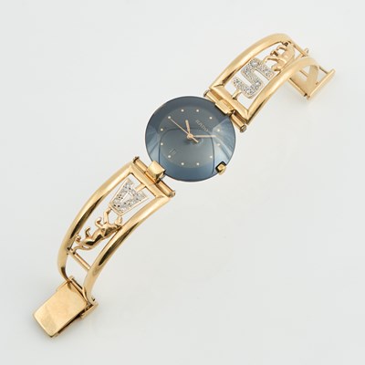 Lot 105 - Mans Metal Watch, Rado, Quartz with gold band attached, 18K and Metal 33 dwt. all
